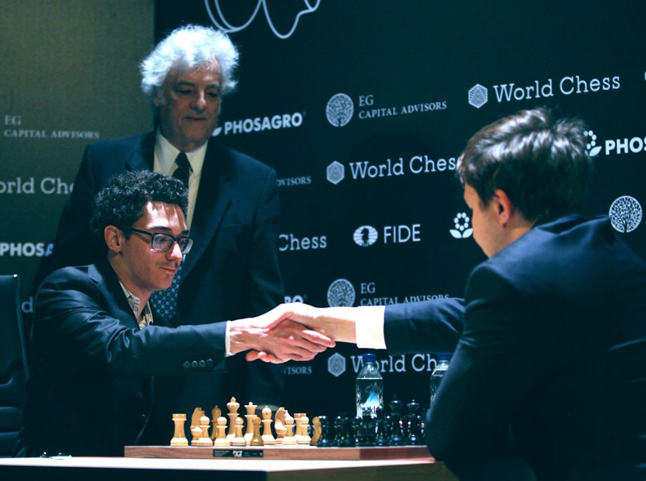 22 March 2018, Germany, Berlin: Italian-American chess champion Fabiano  Caruana competes against Shakhriyar Mamedyarov (not shown), a chess  champion from Azerbaijan, at this year's FIDE World Chess Candidates  Tournament at the Kuehlhaus